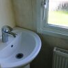 Отель Inviting 3 Bedrooms Caravan gas Central Heating, фото 7