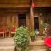 Отель Lijiang Mengli Qianxun Inn, фото 11