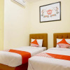 Отель OYO 702 Ganesha Homestay, фото 6