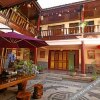 Отель Xinniu Inn (Lijiang Ancient City Dashuiche Shop), фото 26
