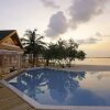 Отель Cinnamon Dhonveli Maldives - Water Suites на Острове Чаайя