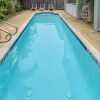 Отель Sleeps 6 in a 4plex w Pool, Only a Block to Beach, фото 15