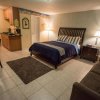 Отель Camelot Beach Suites, фото 1