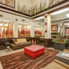 Отель Comfort Suites At Rivergate Mall, фото 2