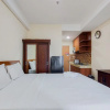 Отель Homey And Modern Studio Apartment At B Residence, фото 4