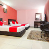Отель Putra Iskandar by OYO Rooms, фото 1