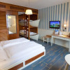 Отель Europa-Park Freizeitpark & Erlebnis-Resort, Hotel Bell Rock, фото 5