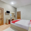 Отель OYO Flagship Tembok Batu Residence, фото 5