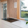 Отель 12 Person Holiday Home in Ebeltoft, фото 4
