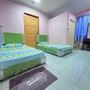Отель OYO Home 90415 Seri Desa Homestay, фото 8