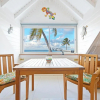 Отель Deja Blue - Comfortable Beachfront condo, фото 5