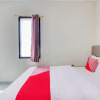 Отель OYO 92861 Raya Guest House Syariah, фото 5
