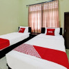 Отель OYO 92001 Unram Guest House, фото 15