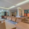 Отель RedDoorz @ Hotel Arimbi Dewi Sartika Baru, фото 12