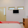 Отель Oyo1509 Candi Panggung Family Guesthouse, фото 7