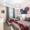 Отель Charming condo with Mickey themed decorated bedroom near Disney, фото 1