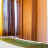 Отель Treebo Naunidh Suites, фото 11