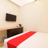 Отель RedDoorz @ Raya Kelapa Dua, фото 4