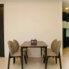 Отель Modern and Comfortable 2BR at The Empyreal Condominium Epicentrum Apartment, фото 11