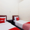 Отель New Sejarah by OYO Rooms, фото 14