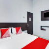 Отель OYO 90419 Azzahra Homestay Syariah, фото 4