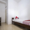 Отель Oyo 659 Kost And Home Stay Wisma Mulia, фото 4