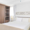 Отель Nice And Comfort Studio Room At Azalea Suites Apartment, фото 10