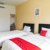 Отель Formerly Reddoorz Plus Near Teras Kota 3, фото 18
