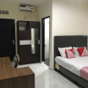 Отель OYO 2129 Toar House Manado, фото 10