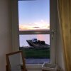 Отель Lovely 3-bed Cottage, Portmahomack Next to Harbour, фото 7
