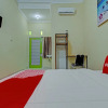 Отель Super OYO 3774 Orchid 37 Syariah Guest House, фото 15