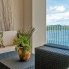 Отель Ocean View Luxury Condo at Flamingo Towers, фото 16