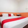 Отель RedDoorz near Jalan Jendral Sudirman Manado, фото 21