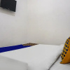 Отель Spot On 90928 Wisma Asri Putra Syariah, фото 8
