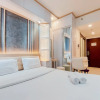 Отель High Floor And Simply Look Studio At Sky House Bsd Apartment, фото 9