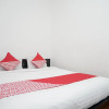 Отель OYO 445 Lavender Homestay Syariah, фото 4