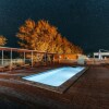 Отель Peumayen Atacama / Hostal & Cabaña в Сане Педре де Атакаме