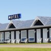 Отель Motel de la Pointe в Римоусках