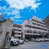 Отель Xinguolv Hotel, фото 1
