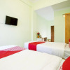 Отель OYO 1419 Rhona Guest House Syariah, фото 6