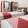 Отель OYO 765 Wisma Andalas Asri Syariah, фото 8