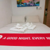 Отель Nida Rooms Jerman Beach 12 at Green Roof Homestay, фото 9