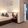 Отель Ramada by Wyndham Frankfurt Central Station, фото 5