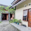 Отель Capital O 93716 Family Guesthouse Syariah, фото 1