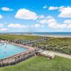 Отель Oceanfront Beach Condo with Private Balcony, Short Walk to Pool and Beach by RedAwning, фото 14