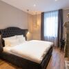 Отель Munich Rooms Hotel в Мюнхене