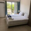 Отель Modern studio apartment in Paphos Gardens Resort, фото 4
