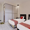 Отель OYO 91861 Pemuda Kemuning Guest House, фото 6