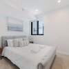 Отель Homehotel Brand New Ultra Luxe Apartment в Сиднее