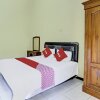 Отель OYO 92387 Ratu Homestay Syariah, фото 4